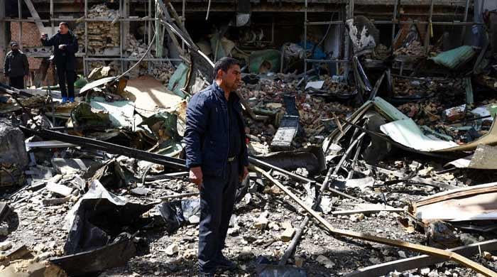 Iran Threatens Devastating Response After US, Israeli Attacks