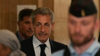 Sarkozy denies Libya funding charges in appeal trial